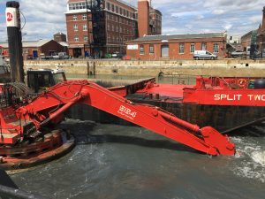 Witton dredging along side the HMS WARRIOR