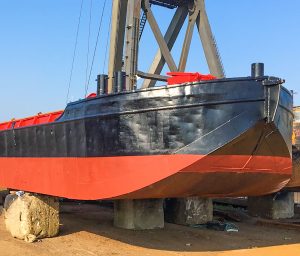small hopper barge, road transportable